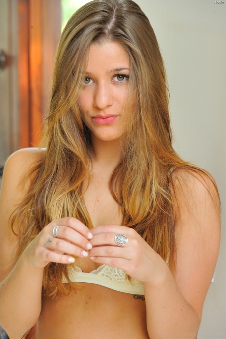 Sweet teen with long hair slips panties aside to show bald twat and tight ass 29028643