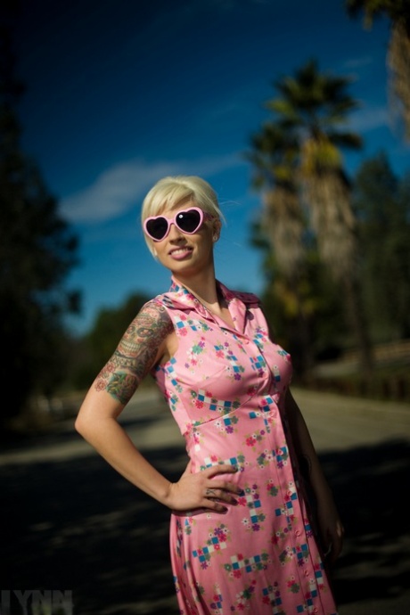 Hot blonde Lynn Pops flashes her big tits in public locations 79378481